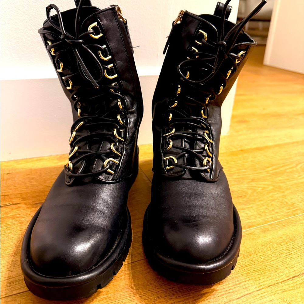 Women’s black leather combat lace-up boots